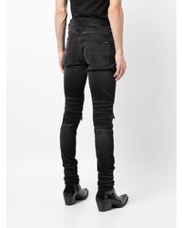 schwarze enge Jeans mit Destroyed-Effekten von Amiri