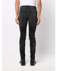 schwarze enge Jeans mit Destroyed-Effekten von Amiri