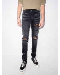 schwarze enge Jeans mit Destroyed-Effekten von Amiri