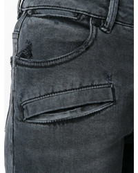 schwarze enge Jeans mit Destroyed-Effekten von PIERRE BALMAIN