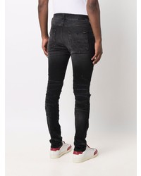 schwarze enge Jeans mit Destroyed-Effekten von Amiri