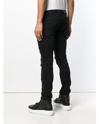 schwarze enge Jeans mit Destroyed-Effekten von Balmain