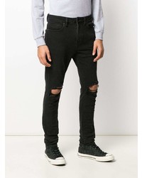 schwarze enge Jeans mit Destroyed-Effekten von Neuw