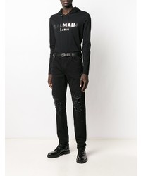 schwarze enge Jeans mit Destroyed-Effekten von Balmain