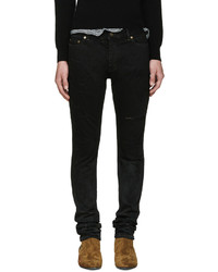 schwarze enge Jeans mit Destroyed-Effekten von Saint Laurent