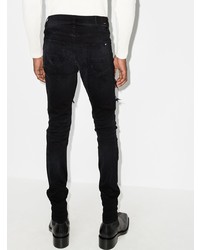 schwarze enge Jeans mit Destroyed-Effekten von Amiri