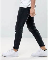 schwarze enge Jeans mit Destroyed-Effekten von Pull&Bear
