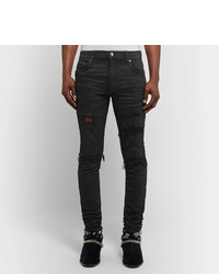 schwarze enge Jeans mit Destroyed-Effekten von Amiri