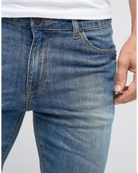 schwarze enge Jeans mit Destroyed-Effekten von Asos