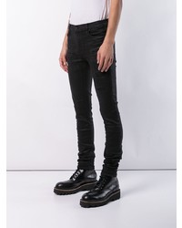 schwarze enge Jeans mit Destroyed-Effekten von RtA