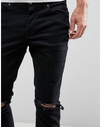 schwarze enge Jeans mit Destroyed-Effekten von Hype