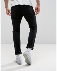 schwarze enge Jeans mit Destroyed-Effekten von Hype