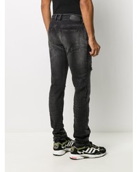 schwarze enge Jeans mit Destroyed-Effekten von Diesel