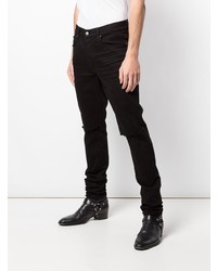 schwarze enge Jeans mit Destroyed-Effekten von Amiri