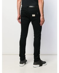 schwarze enge Jeans mit Destroyed-Effekten von Philipp Plein