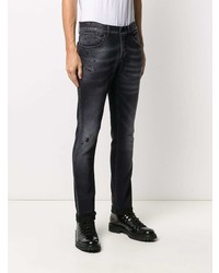 schwarze enge Jeans mit Destroyed-Effekten von Dondup