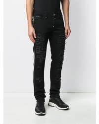 schwarze enge Jeans mit Destroyed-Effekten von Philipp Plein