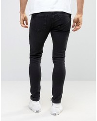 schwarze enge Jeans mit Destroyed-Effekten von Ringspun