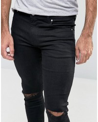 schwarze enge Jeans mit Destroyed-Effekten von Asos