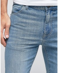 schwarze enge Jeans mit Destroyed-Effekten von Asos