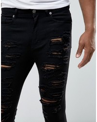 schwarze enge Jeans mit Destroyed-Effekten von Jaded London