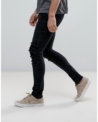 schwarze enge Jeans mit Destroyed-Effekten von Asos