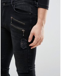 schwarze enge Jeans mit Destroyed-Effekten von Asos