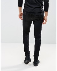 schwarze enge Jeans mit Destroyed-Effekten von Asos