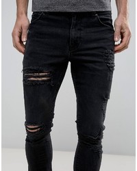 schwarze enge Jeans mit Destroyed-Effekten von Asos