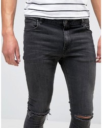 schwarze enge Jeans mit Destroyed-Effekten von Asos