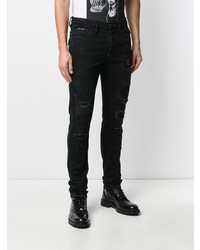 schwarze enge Jeans mit Destroyed-Effekten von Philipp Plein