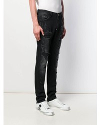 schwarze enge Jeans mit Destroyed-Effekten von Philipp Plein