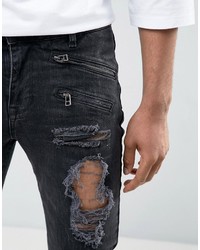 schwarze enge Jeans mit Destroyed-Effekten von Asos