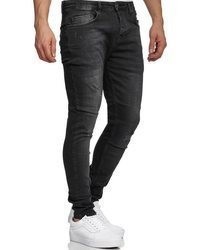 schwarze enge Jeans mit Destroyed-Effekten von Tazzio