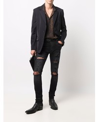 schwarze enge Jeans mit Destroyed-Effekten von Amiri