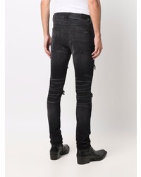 schwarze enge Jeans mit Destroyed-Effekten von Amiri