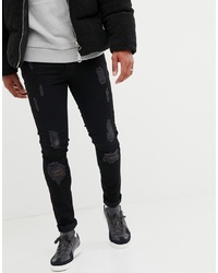 schwarze enge Jeans mit Destroyed-Effekten von Voi Jeans