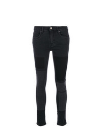 schwarze enge Jeans mit Flicken