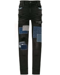 schwarze enge Jeans mit Flicken von Amiri