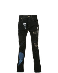 schwarze enge Jeans mit Flicken von Black Fist