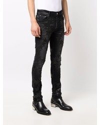 schwarze enge Jeans mit Sternenmuster von Amiri