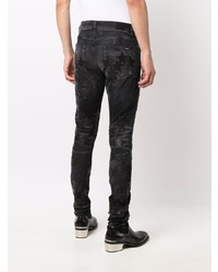 schwarze enge Jeans mit Sternenmuster von Amiri