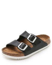 schwarze flache Sandalen aus Leder von Birkenstock