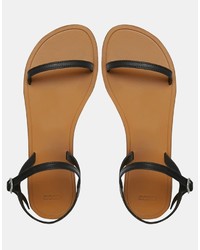 schwarze flache Sandalen aus Leder von Asos