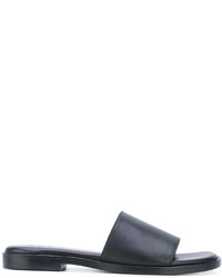 schwarze flache Sandalen aus Leder von DKNY