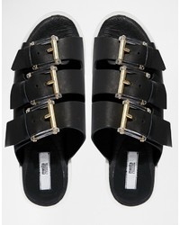 schwarze flache Sandalen aus Leder von Miista