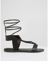 schwarze flache Sandalen aus Leder von Asos