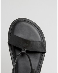 schwarze flache Sandalen aus Leder von Asos