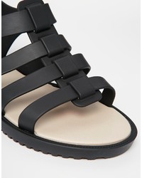 schwarze flache Sandalen aus Leder von Melissa