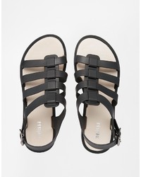 schwarze flache Sandalen aus Leder von Melissa